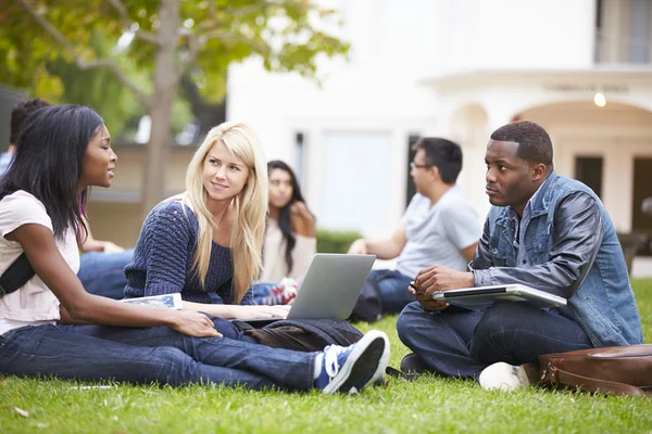 depositphotos_48461095-Group-Of-University-Students-Working-Outside-Together